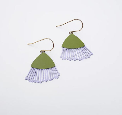 The Mini Gum Blossom Pink & Eggplant Earrings by Blue Dog Posters feature green semi-circular tops and purple tassel-like fringes, hanging from gold hooks and displayed on a plain white background.