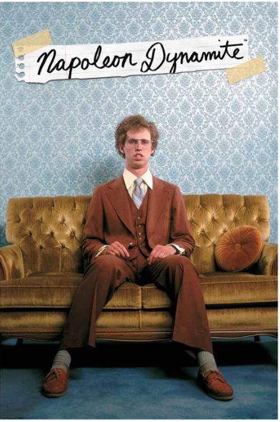 A man with curly hair, glasses, and a brown suit sits on a gold sofa against blue wallpaper. "Napoleon Dynamite" is displayed above him—a classic MTV 090 poster perfect for fans of this cult favorite.