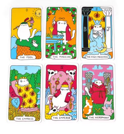 The Cat Paws Tarot Cards by Blue Dog Posters feature six cards with cartoon cats in vibrant costumes: The Fool, The Magician, The High Priestess, The Empress, The Emperor, and The Hierophant. Each card boasts playful illustrations and lively backgrounds.