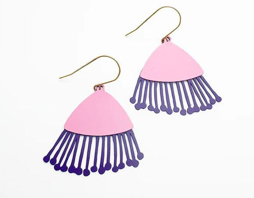 The Blue Dog Posters Mini Gum Blossom Pink & Eggplant Earrings feature pink semi-circular tops with dark purple, fringe-like extensions dangling below, displayed against a white background.