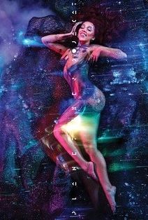 A woman poses against a glittery, cosmic backdrop with glowing lights, wearing a shimmery outfit and joyful expression—a dreamy vibe perfect for any Doja Cat - Planet Her fan. From the MUS 117 brand, this display enhances any pop music collection.