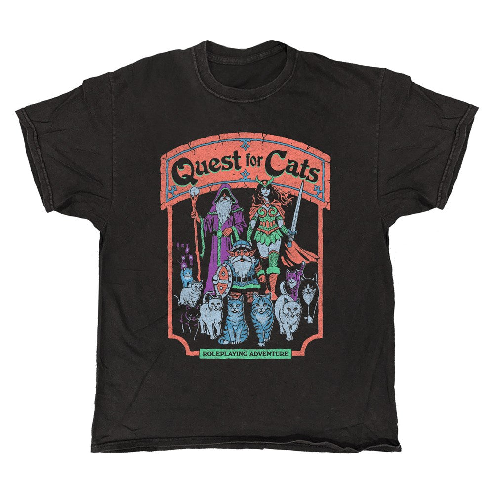 Show your love for cats and fantasy with the Blue Dog Posters Quest For Cats Vintage Look T-Shirt—black, available in S/M/L—with a colorful design of feline characters and "Quest for Cats: Roleplaying Adventure" text.