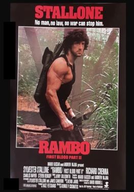 MTV 143's "Rambo" poster features a muscular, long-haired man with a large weapon in the jungle. Text above reads: "Stallone. No man, no law, no war can stop him.