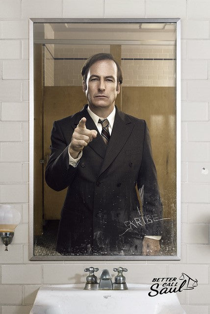 A man in a suit stands in a bathroom, facing a mirror labeled "Better Call Saul Mirror" by MTV 030. He points directly at the viewer, while the reflection shows a faucet below.