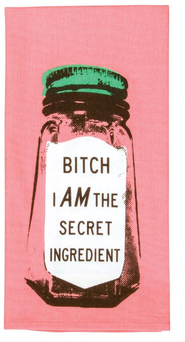 The Secret Ingredient Dish Towel by Blue Dog Posters is a standout piece in any homewares collection. This pink tea towel features a graphic of a spice jar with a green lid, and the jar's label boldly declares "BITCH I AM THE SECRET INGREDIENT." Made of high-quality cotton, it offers both style and durability.