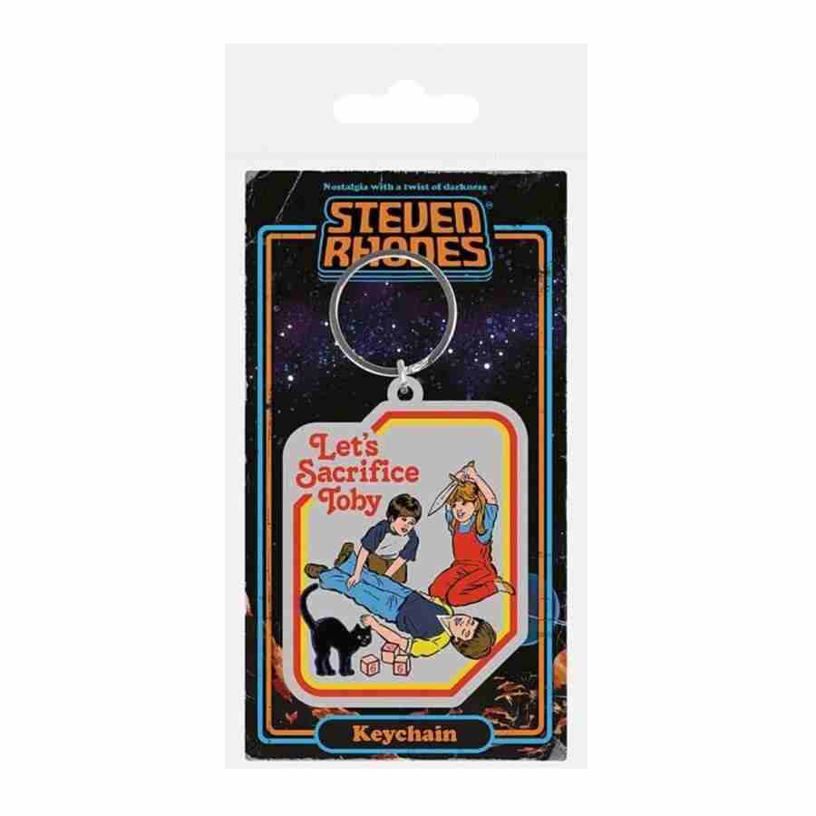 The Steven Rhodes Sacrifice Toby Keyring by Blue Dog Posters displays a vintage-style illustration of three children, with one lying down and eyes closed while the others hold daggers above. The text reads "Let's Sacrifice Toby," accompanied by a black cat against a starry background.