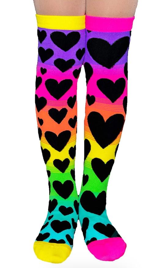 Step into the rhythm of dance with every move wearing Blue Dog Posters' Madmia Sunset Socks. These vibrant knee-high socks, featuring a lively black heart pattern and a stunning rainbow gradient of yellow, pink, purple, green, orange, and blue hues are designed to fit most sizes.