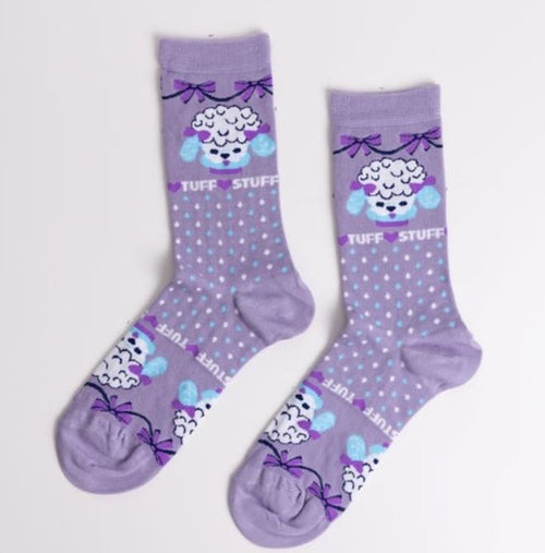 Blue Dog Posters' Tuff Stuff Poodle Women's Socks feature lavender fabric with white polka dots, purple bows, a cartoon poodle face above "TUFF STUFF" in white, and have purple heels, toes, and cuffs.