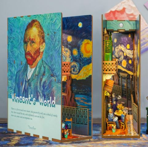 The Vincent's World Book Nook Tonecheer by Blue Dog Posters showcases a portrait of van Gogh on one side and a mini scene inspired by "Starry Night" and a cozy café on the other, bringing his art to your bookshelf.