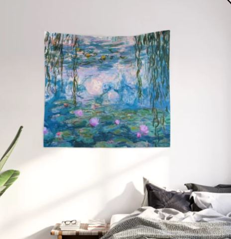 A cozy bedroom corner featuring a bed adorned with gray and white linens, and a small nightstand holding books and a pair of glasses. Above the bed hangs the "Water Lilies Monet Art Textile Lge" by Blue Dog Posters, showcasing a serene water lily scene in bright blues and greens.