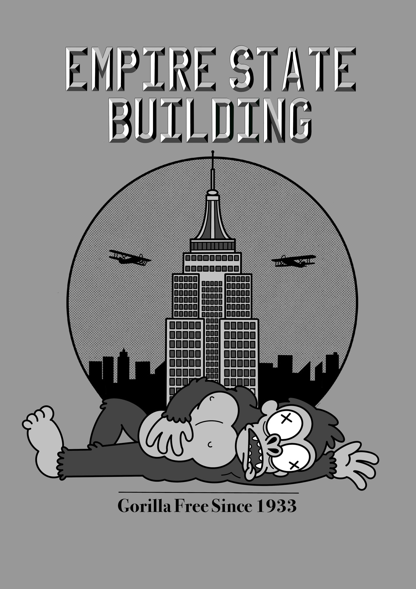 A monochrome cartoon-style image shows the Empire State Building with airplanes flying around it. In the foreground, a large gorilla lies unconscious or dead. Text above reads "EMPIRE STATE BUILDING," and below it says "Gorilla Free Since 1933." This high quality Art Print, **Empire State Building by John R Paine**, is part of our Featured Artists Collection, crafted on 250gsm Satin Paper by **fap**.