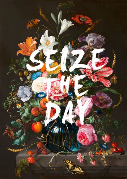 Set against a dark backdrop, "Seize The Day by The Quote House A5" from fap showcases an eye-catching floral arrangement in a vase, featuring colorful roses and lilies. Bold white text stating "SEIZE THE DAY" overlays the image, giving it the sophisticated appearance of one of the deluxe postcard frames from the Little Art series.