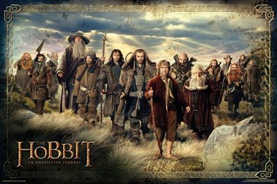 A group of characters from "The Hobbit: An Unexpected Journey" stand in a rugged landscape, dressed in adventurous and medieval-style clothing, holding weapons and supplies. With dramatic mountains in the background and the title at the bottom, this hit movie poster is printed on premium 150gsm gloss paper by MTV 222 under the product name The Hobbit.