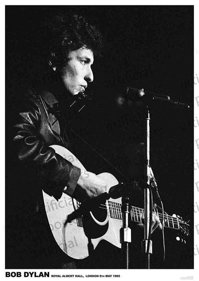 Black and white music poster of Bob Dylan with curly hair playing an acoustic guitar and singing into a microphone on stage, dated "Royal Albert Hall, London 9th May 1965." Printed on premium gloss paper by MUS 063.