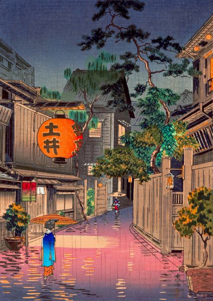 A serene Japanese street scene at dusk with traditional wooden buildings captures the essence of tranquility. A person in a blue kimono holding an umbrella walks along the wet street, reflecting the lanterns' warm glow. In the background, a large red lantern with Japanese characters completes this exquisite Evening at Ushigome - Koitsu Tsuchiya printed on 250gsm Satin Paper by A3 502.