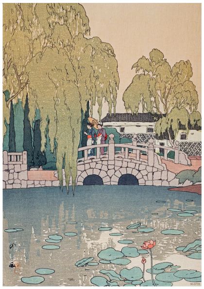A serene scene of people standing on a stone bridge, overlooking a pond with water lilies and a single lotus flower. Weeping willows and other trees surround the area, reflecting in the calm water. A traditional building is visible in the background, captured perfectly as an A3 Yoshido Willow and Stone Bridge by Y on high quality 250gsm satin paper.