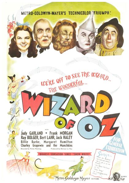 A vintage movie poster for "The Wizard of Oz" printed on high-quality Satin Paper featuring illustrations of the main characters: Dorothy, the Scarecrow, the Cowardly Lion, the Tin Man, and the Wicked Witch. The colorful title is prominent with additional text listing cast names and production details. This product is called **The Wizard of Oz** by **Y**.