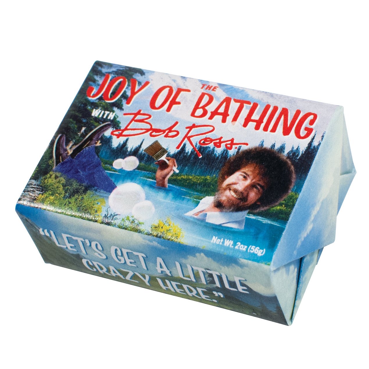 Introducing the Bob Ross Joy of Bathing Mini Soap by Blue Dog Posters. This whimsically designed soapbox showcases a scenic outdoor setting, bubbles, and Bob Ross holding a paint palette and brush, along with his iconic quote, "Let's get a little crazy here." With a net weight of 2oz (56g), indulge in an exfoliating experience and embrace your inner artist.