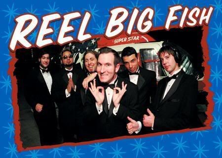 A group of six men dressed in black tuxedos and bow ties pose before a backdrop. Most are smiling, and the central figure is making an "OK" hand gesture. The text above them reads "Reel Big Fish" with a star and the words "Super Star" in the background—a perfect addition to any music collection by MUS.