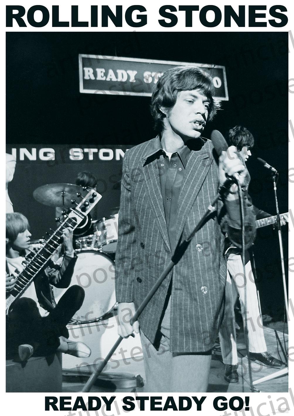 Black and white rock poster of a band performing on stage. The singer in front is holding a microphone, while other band members play instruments in the background. Printed on premium 150gsm gloss paper, the text at the top reads "ROLLING STONES" and at the bottom reads "READY STEADY GO!" Perfect for any music collection.
Introducing MUS 331's latest product: Rolling Stones!