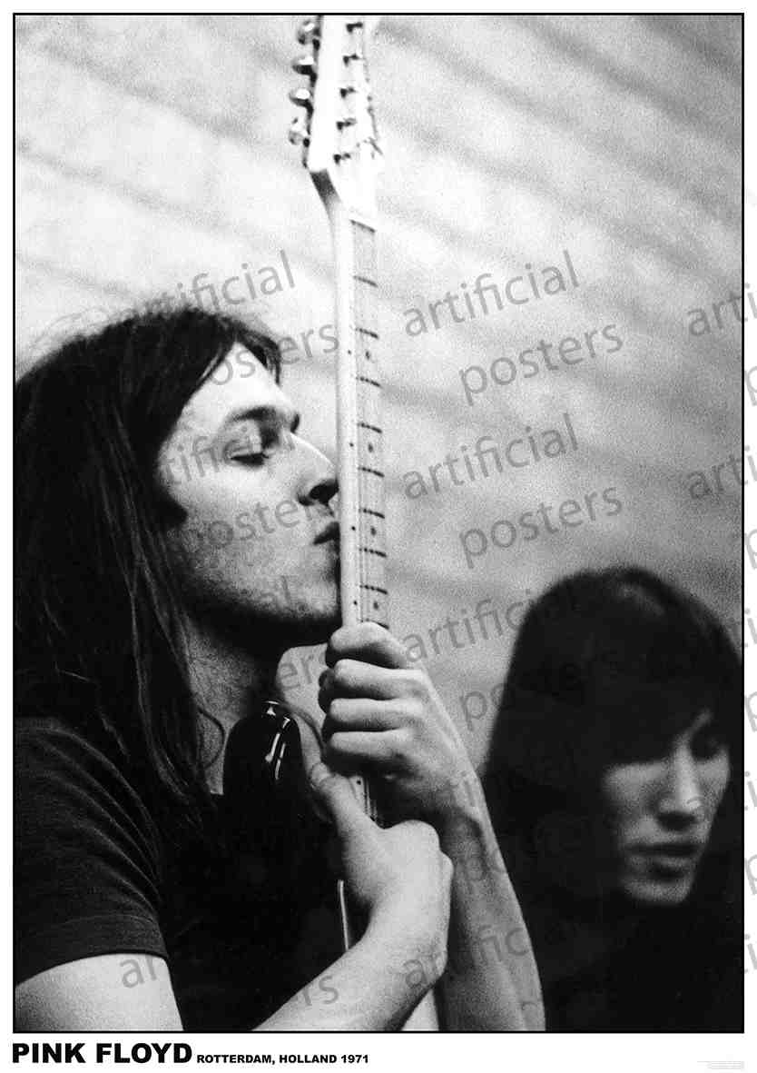 A black and white photo shows one member of Pink Floyd with long hair kissing the neck of a guitar, while another long-haired member stands behind. The text at the bottom reads: "Pink Floyd Rotterdam, Holland 1971." The background features "artificial posters" watermarks, perfect for any rock poster collection. Product Name: Pink Floyd 1971 Brand Name: MUS 260