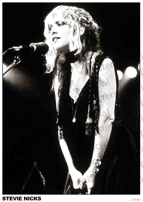 A black and white photo of Stevie Nicks singing on stage in a dark dress with layered necklaces and wavy hair—an eye-catching MUS collectible for any music lover or rock poster fan.