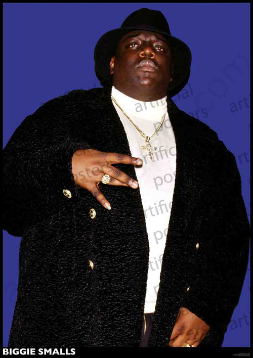 A person is standing against a blue background, dressed in a black hat, black coat, and white turtleneck. They are adorned with gold rings and necklaces while making a hand gesture. Text at the bottom of this MUS 113 Notorious B I G NY Coliseum 1995 poster reads "BIGGIE SMALLS.