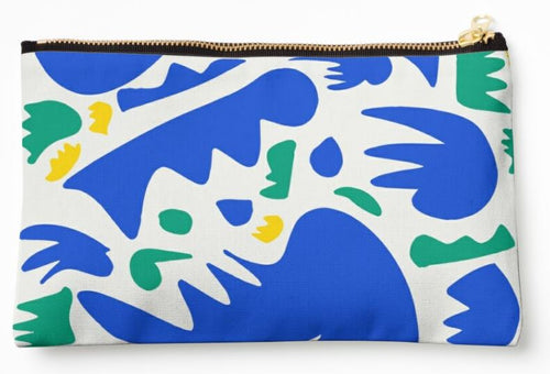 The Blue Dog Posters "Abstract Blue Shapes Zipper Pouch Lge" is a durable polyester canvas rectangular pouch with a top zipper. It features an abstract design of large, bold shapes in blue and green with smaller yellow accents on a white background. The high-quality print is complemented by a black zipper with a gold pull tab.