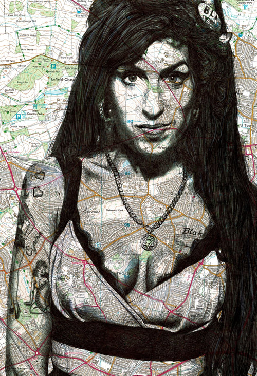 A black and white drawing of a person with long hair and tattoos, set against a detailed map background. The map is layered over the person's face and body, blending geographical elements with the portrait. This striking artwork, available as an art print on satin paper, has a textured, mixed-media appearance. It's titled **Amy Winehouse by The Art of the North**, brought to you by **fap**.