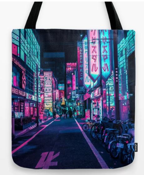The Tote Bag 40x40cm Neon Wonderland from Blue Dog Posters boasts a high-quality blended fabric showcasing a vibrant urban street scene at night, beautifully illuminated by neon signs in shades of blue, pink, and teal. The sidewalks are lined with bicycles and buildings festooned with numerous signs in Japanese characters – an ideal addition to any Giftware Collection.