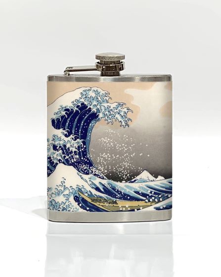 The Great Wave Hip Flask by Blue Dog Posters is a stainless steel hip flask adorned with a design inspired by Hokusai's iconic woodblock print "The Great Wave off Kanagawa." This artwork showcases a dramatic, stylized blue wave cresting, with boats and Mount Fuji in the background, making it one of the coolest gifts for art lovers.
