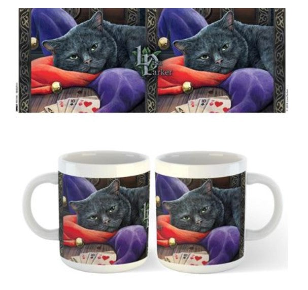 Two images of the Lisa Parker Mug - Jester are shown from Blue Dog Posters' Homewares Collection. The mug features an illustration of a black cat resting on a red pillow, surrounded by colorful objects like playing cards and a purple satin cloth. The design appears on both sides of this dishwasher-safe mug.