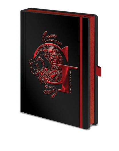 The Harry Potter Gryffindor Premium Notebook by Blue Dog Posters features a black hardcover with an embossed red lion design on the front. The edges are highlighted in red and it includes a matching red strap on the side. This high-quality hard cover stationery gift boasts gridded pages inside, perfect for detailed notes or sketches.