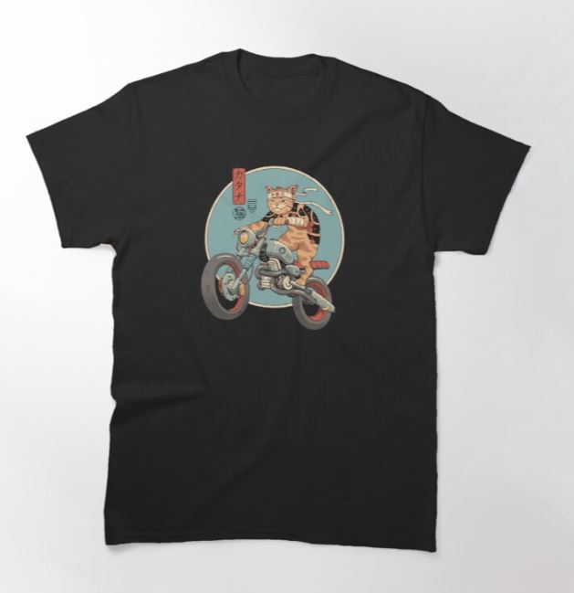 The Catana Motorcycle Tshirt in size LGE features a cartoon graphic of a cat wearing sunglasses and a leather jacket, riding a motorcycle against a circular background. The design includes some Japanese text on the left side. This super cool T-shirt is from Blue Dog Posters and comes in black.