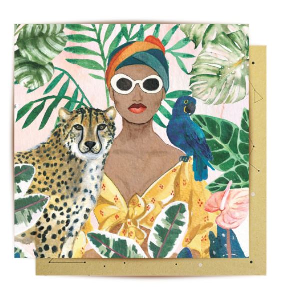 An illustration of a woman wearing a colorful headscarf and white sunglasses, accompanied by a cheetah and a blue parrot. The woman, dressed in a yellow-patterned outfit, stands amidst lush green tropical leaves. This piece is part of our exclusive Giftware Collection from Blue Dog Posters and showcases exceptional quality materials. Introducing the Greeting Card - Cheetah.
