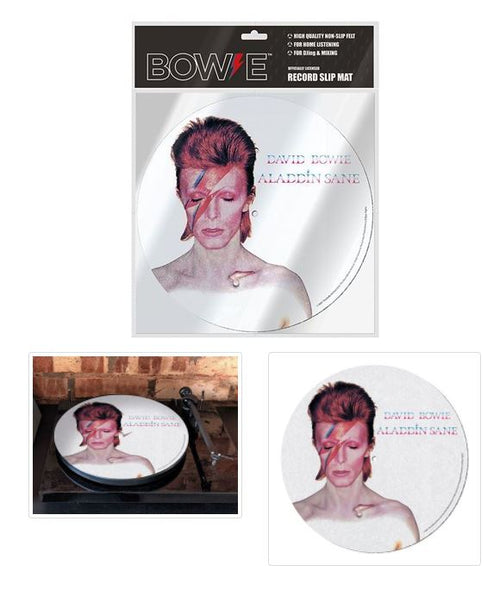 Introducing the "David Bowie Slipmat" by Blue Dog Posters, showcasing an iconic image of David Bowie as Aladdin Sane with the famous lightning bolt face paint. Crafted from high-quality felt, this slipmat keeps your records stable during playback. The packaging features images of the slipmat on a turntable and close-up shots, all set against a brick background.