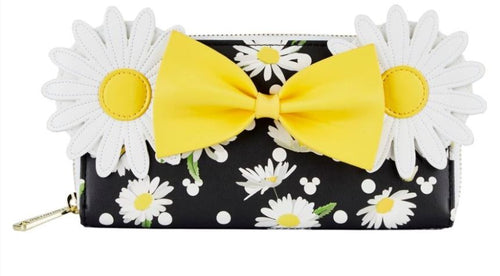 The Disney Minnie Mouse Daisies Zip Purse by Blue Dog Posters is a black and white vegan leather clutch adorned with a daisy pattern. The top showcases two large 3D daisies with yellow centers, highlighted by a prominent yellow bow in the middle. A gold zipper pull adds a magical touch to this Disney licensed bag.
