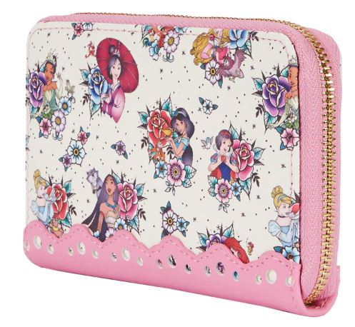 The Blue Dog Posters Disney Princess Floral Tattoo Zip Purse features illustrations of various princesses surrounded by floral designs on a white vegan leather background. It is pink with colorful images of princesses and flowers and adorned with scalloped detailing along the bottom edge.