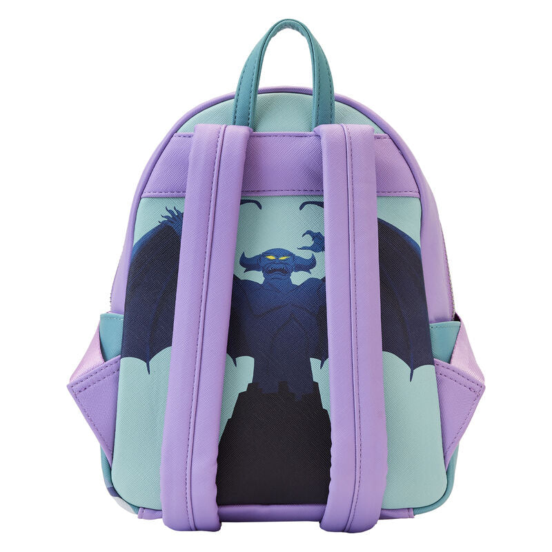 The Blue Dog Posters Disney Villains Colour Block Mini Backpack is a small, stylish accessory that features a vibrant design on the back. The main image depicts a dark, bat-like creature with glowing yellow eyes and wide-spread wings. The backpack showcases purple and teal colors, complemented by purple straps and teal accents.