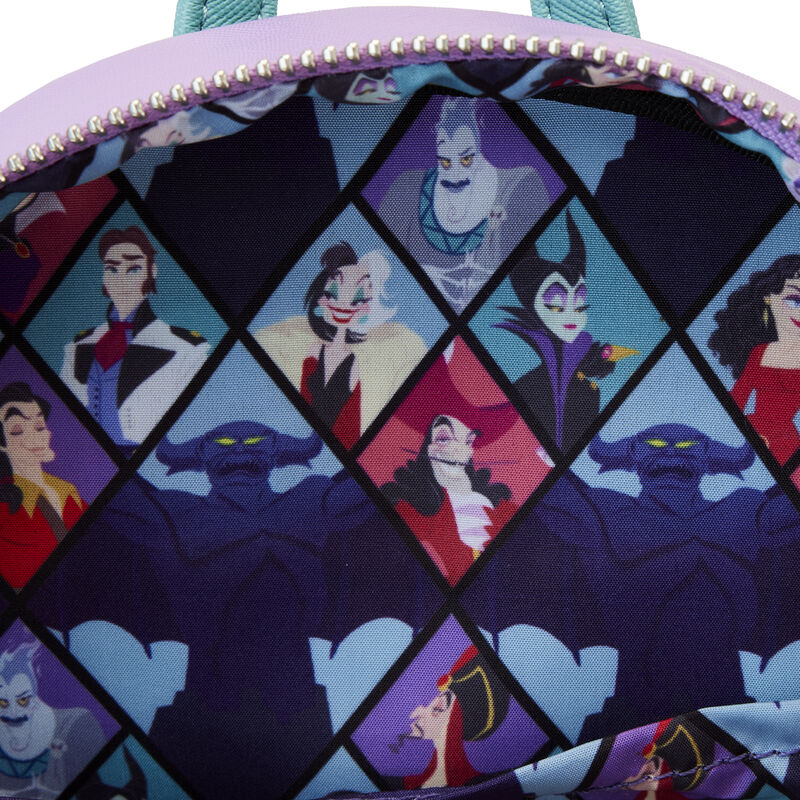 A detailed look at the interior of the Disney Villains Colour Block Mini Backpack by Blue Dog Posters showcases a lively pattern featuring classic Disney Villains arranged in a diamond grid. The vivid villains are depicted in dynamic poses on a dark backdrop, all securely enclosed by a robust zipper.