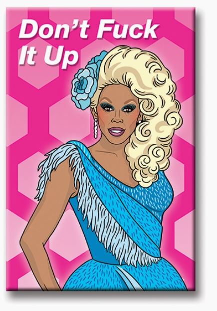 Illustration of a drag queen with voluminous blonde hair wearing a blue dress adorned with fringe. The background features a pattern of pink hexagons. The text "Don't Fuck It Up" is written at the top in white letters, making the Ru Paul Don't Fuck it Up Magnet by Blue Dog Posters perfect for grabbing your house guests' attention and holding important notes on your fridge.