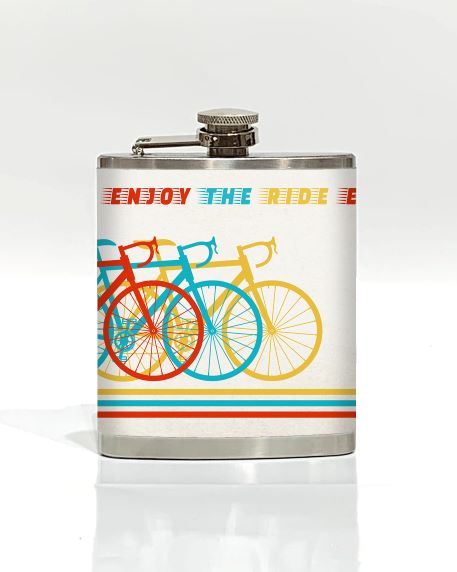 The "Bikes - Multi Hip Flask" by Blue Dog Posters is a stainless steel flask featuring a vibrant design of three overlapping bicycles in red, turquoise, and yellow. The words "Enjoy the Ride" are printed above the bicycles in coordinating colors, with matching horizontal stripes near the bottom. This hip flask makes for cool gifts!