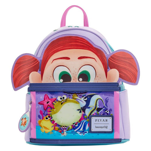 Introducing the Finding Nemo Darla Mini Backpack by Blue Dog Posters: This vibrant backpack showcases an animated character with big green eyes, red hair, and freckles peeking over the top. The front pocket is adorned with a whimsical array of sea creatures reminiscent of Darla's fish tank from Finding Nemo, complete with the "Loungefly Disney-Pixar" label. The backpack features a stunning purple and blue color scheme.
