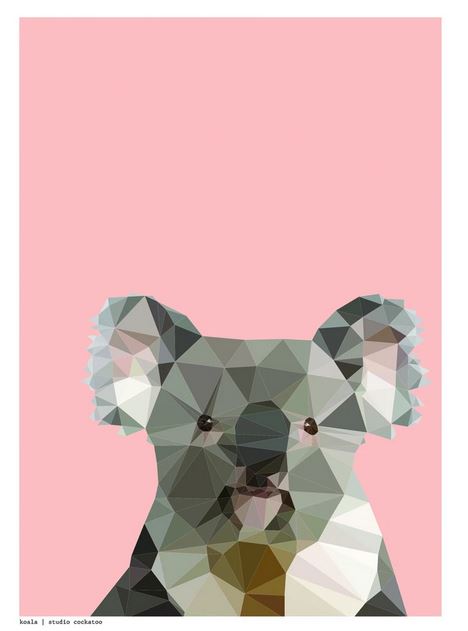 A stylized geometric illustration of a koala is set against a solid pink background. The koala is formed from various colored polygons, giving it a modern, abstract look. Part of the Featured Artists Collection, this art print on satin paper has "Koala by Studio Cockatoo | fap" in small print at the bottom left corner.