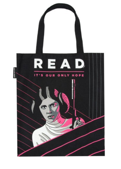 A black tote bag featuring an illustration of Princess Leia holding a blaster, with the text "READ" in bold white letters at the top and "It’s Our Only Hope" below. Part of our exclusive giftware collection, the design incorporates pink and white accents. Perfect for literature lovers! The Blue Dog Posters Out of Print Read Leia Tote is a stylish and functional accessory for any book enthusiast.