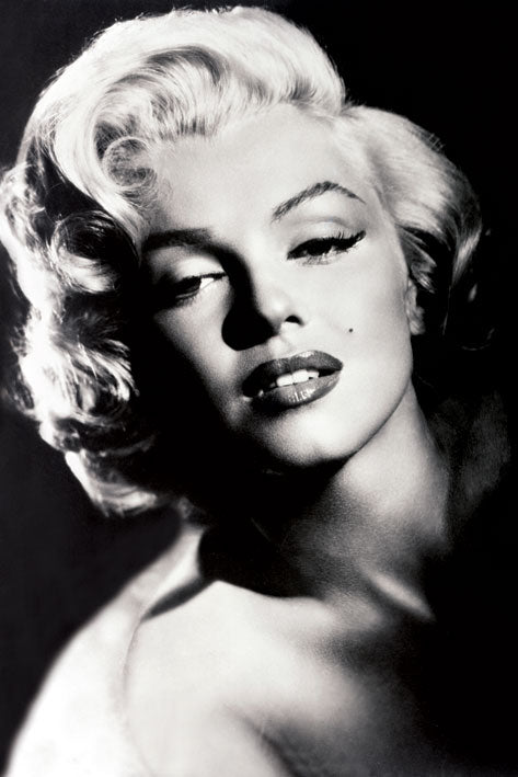 Black and white portrait titled "Marilyn Monroe Glamour" by MTV 225 features a woman with short, curly blonde hair and a beauty mark on her face. She has full lips, arched eyebrows, and strikes a glamorous pose with a slightly parted mouth. The image exudes the timeless allure of a Film Classic Poster from the golden age of Hollywood.