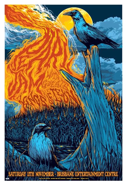 The "Pearl Jam Ravens - Brisbane" concert poster by Ken Taylor, available from Blue Dog Posters, vividly illustrates two blue birds perched on dead trees in a sea of tall grass, with intense flames and dense smoke swirling in the background. This striking artwork promotes the Pearl Jam event scheduled for Saturday, 11th November at the Brisbane Entertainment Centre.