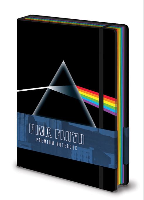 A black A5 notebook by Blue Dog Posters featuring a prism and rainbow design evocative of Pink Floyd's "The Dark Side of the Moon" album cover. This high-quality hardcover includes vibrant edge binding, with a paper band around the cover that reads "PINK FLOYD PREMIUM NOTEBOOK." Ideal for any Stationery Gifts Collection.
