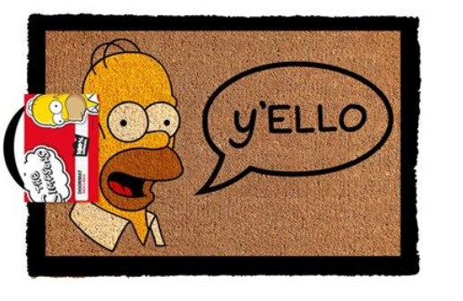A Blue Dog Posters coir door mat featuring a cartoon character with yellow skin and large eyes, wearing a white shirt. The character is saying "y'ello" inside a speech bubble. Part of the cartoon character's image is shown on a tag attached to the doormat, making The Simpsons Yello Door Mat a fun addition to any homewares collection.
