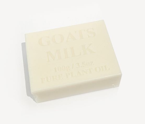A rectangular bar of Hustle and Co Soap - Mansplaining labeled "GOATS MILK 100g/3.5oz PURE PLANT OIL" embossed on the surface. The off-white soap, known for its natural skincare benefits, is placed against a plain white background. This product is offered by Blue Dog Posters.